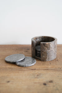Polished marble coasters in grey